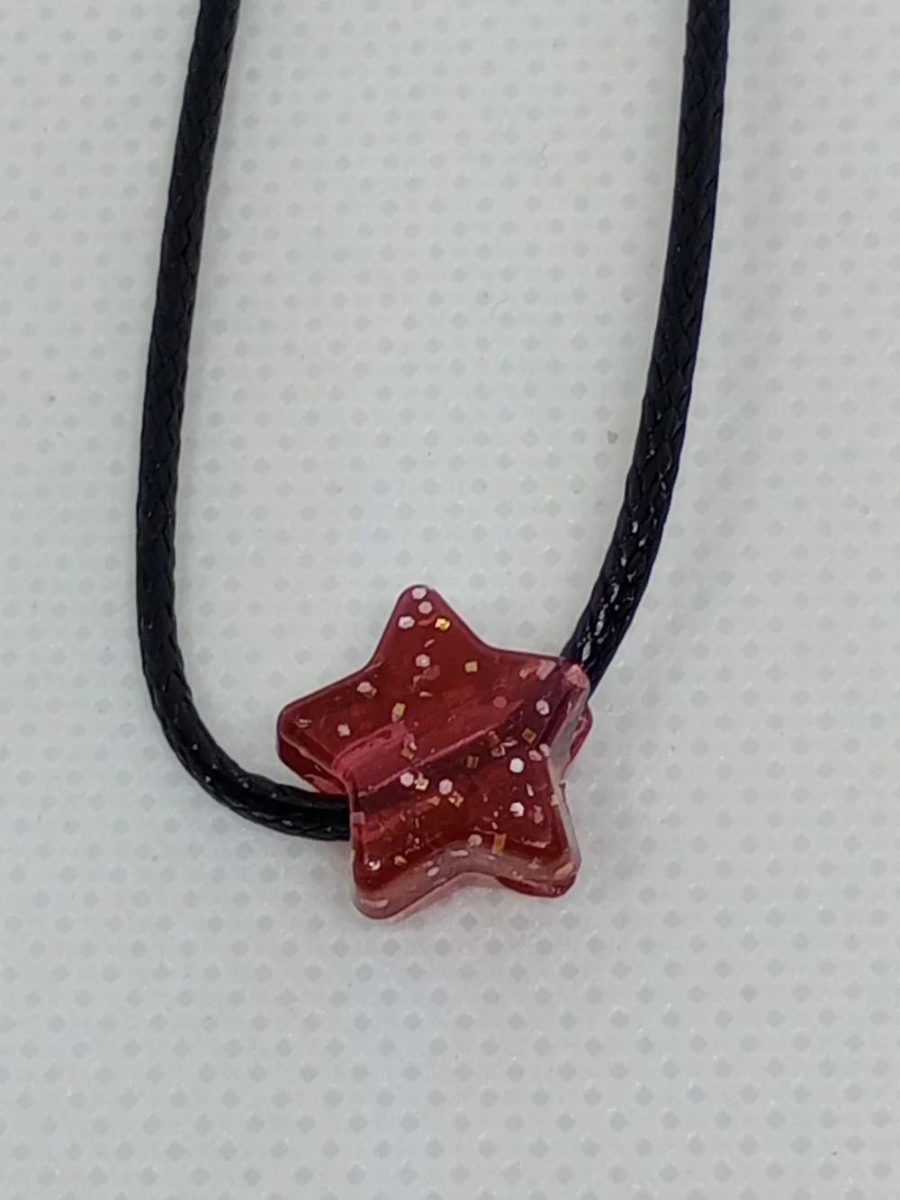 Red STAR Necklace on Black Cord - Unbranded